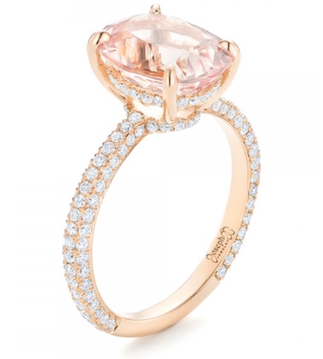 Gold engagement ring with pink center stone and diamonds all around the band. 