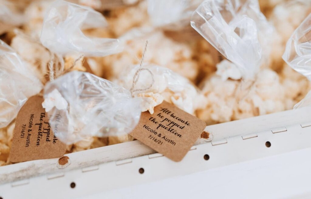 Assorted flavors of popcorn as an end of night wedding favor for guests. 