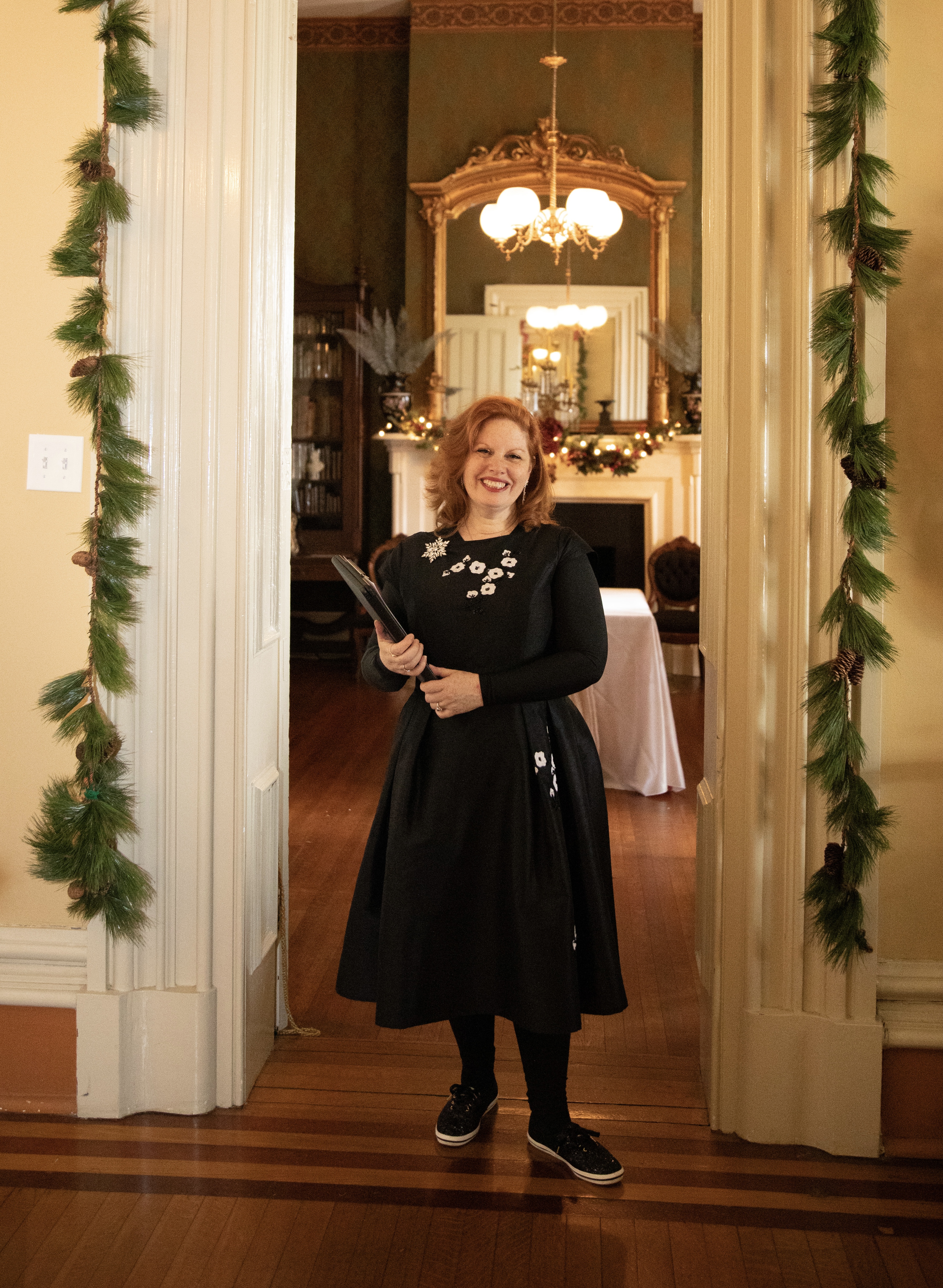 Raina, owner and lead planner of Weddings and Events by Raina at Oaklands Mansion wedding.