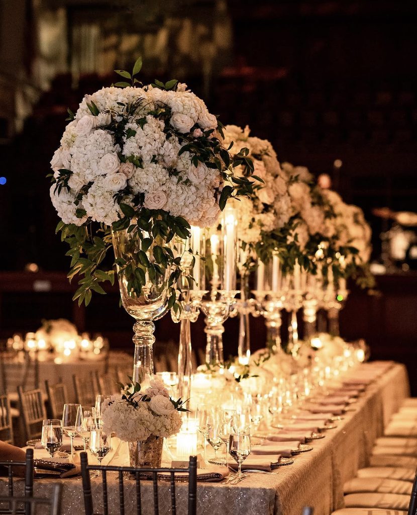 Tall floral arrangements in glass vases at the Schermerhorn Symphony Center in Nashville, Tennessee