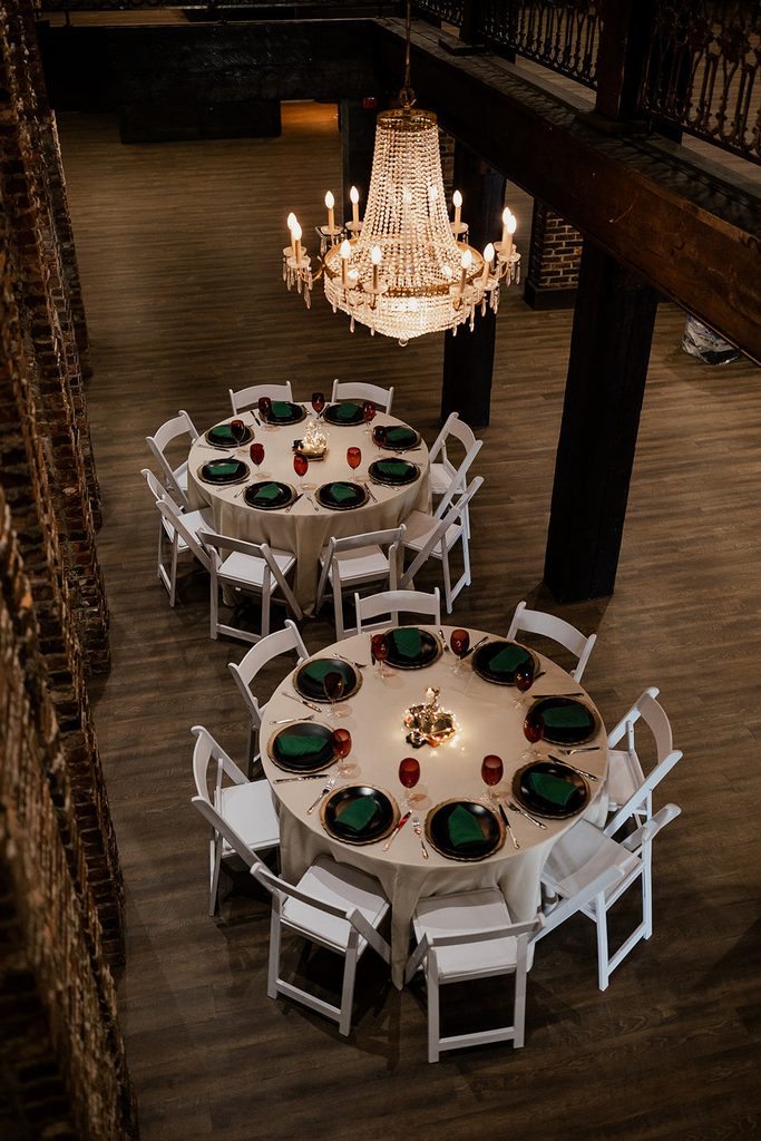 Autumnal wedding at The Bedford Nashville Event Venue with crystal chandeliers, exposed brick and hardwood floors. 