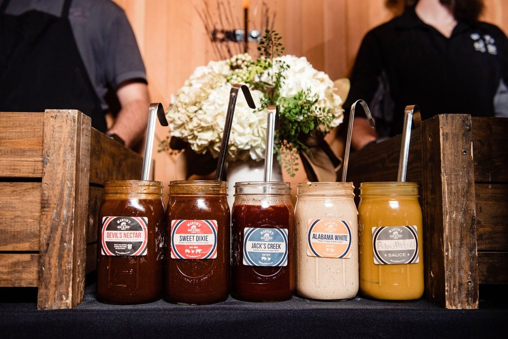 An assortment of five different Nashville barbecue sauces.